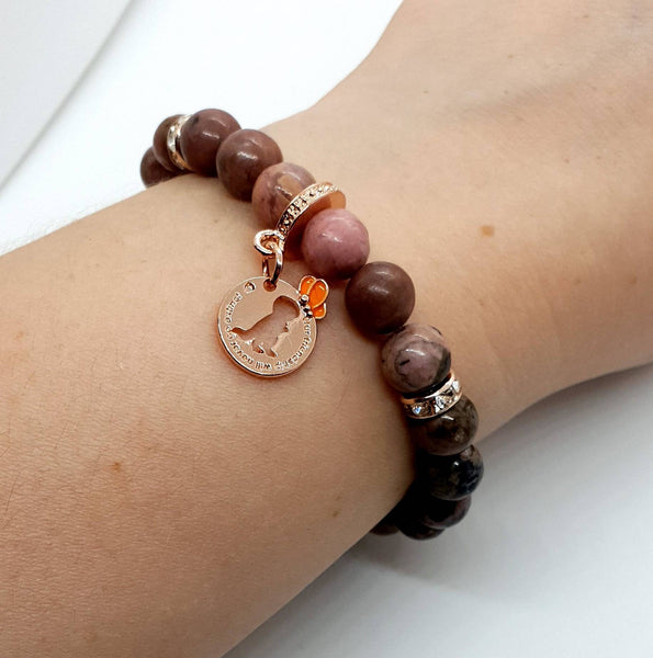 Handmade Rhodonite Crystal Beaded Bracelet With Rose Gold Dinosaur Charm