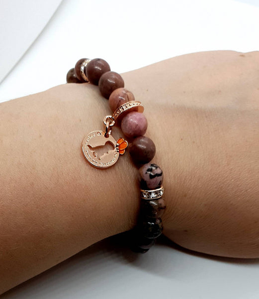 Handmade Rhodonite Crystal Beaded Bracelet With Rose Gold Dinosaur Charm