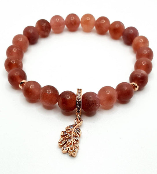 Handmade Strawberry Quartz Crystal Beaded Bracelet With Rose Gold Leaf Charm