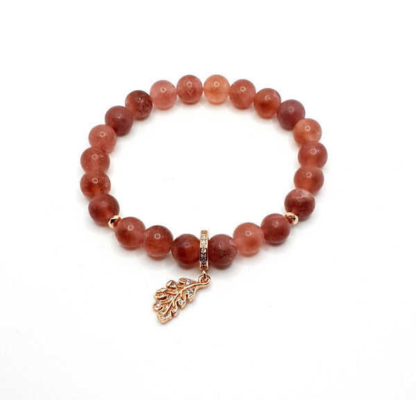 Handmade Strawberry Quartz Crystal Beaded Bracelet With Rose Gold Leaf Charm