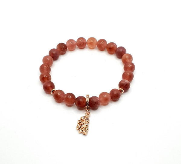 Handmade Strawberry Quartz Crystal Beaded Bracelet With Rose Gold Leaf Charm